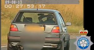 Motorist banned after driving with no hands