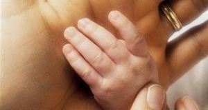 New cars: Family celebrates baby with Kia