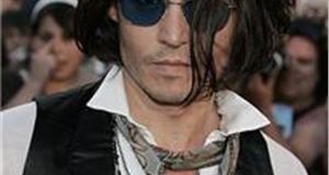 Drivers vote Depp, Kournikova most wanted car wash celebs