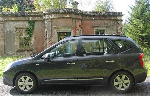 KIA Carens 07 Side 700
