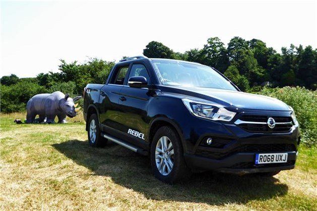 Ssangyong -musso -2018-rebel -f 34-rhino -behind