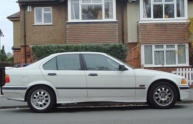 BMW E36 4-dr Side White 700 