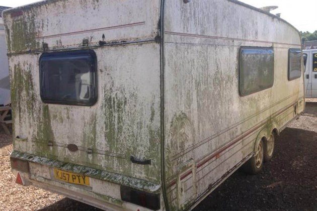 Algae Coated White Caravan